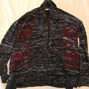 Salt& pepper sweater with Maroon designs.